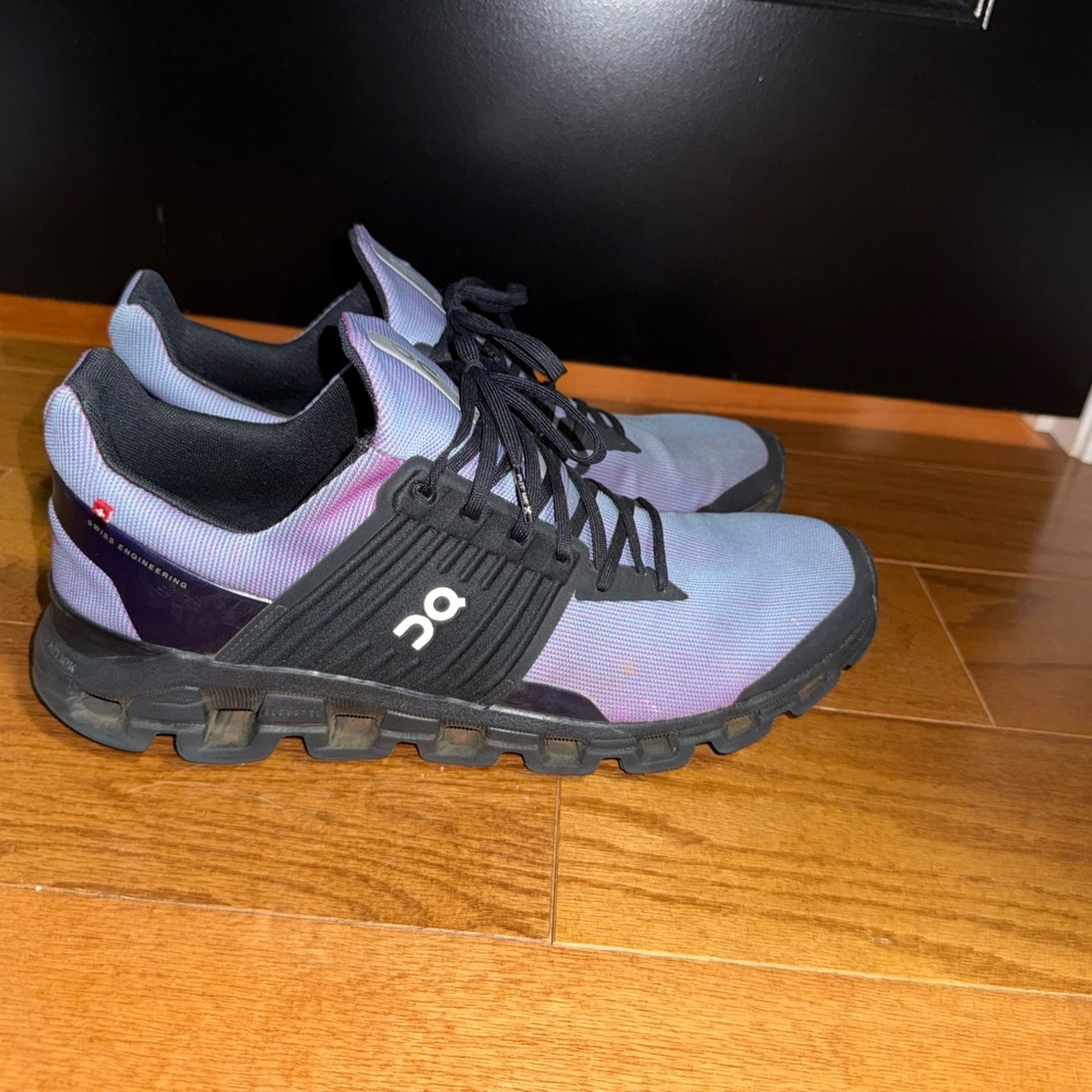 On Running Black and Purple Athletic Shoes with CloudTec Cushioning